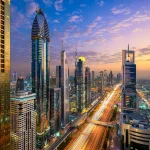 Aerial night view of the skyscrapers along the Sheikh Zayed Road in Dubai, UAE