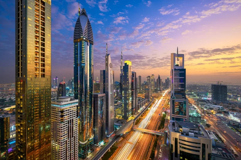 Aerial night view of the skyscrapers along the Sheikh Zayed Road in Dubai, UAE